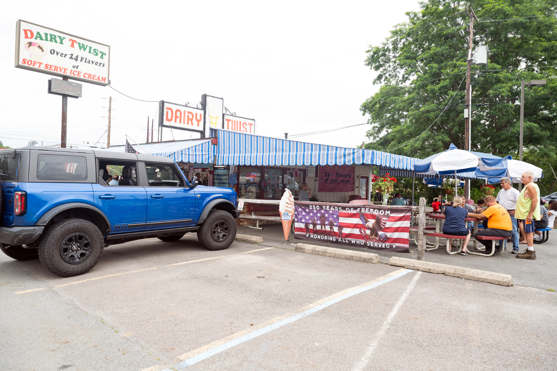 Dairy Twist ice cream stand in Hawley, Pennsylvania with a '250 Years of Freedom, Honoring All Who Served' banner