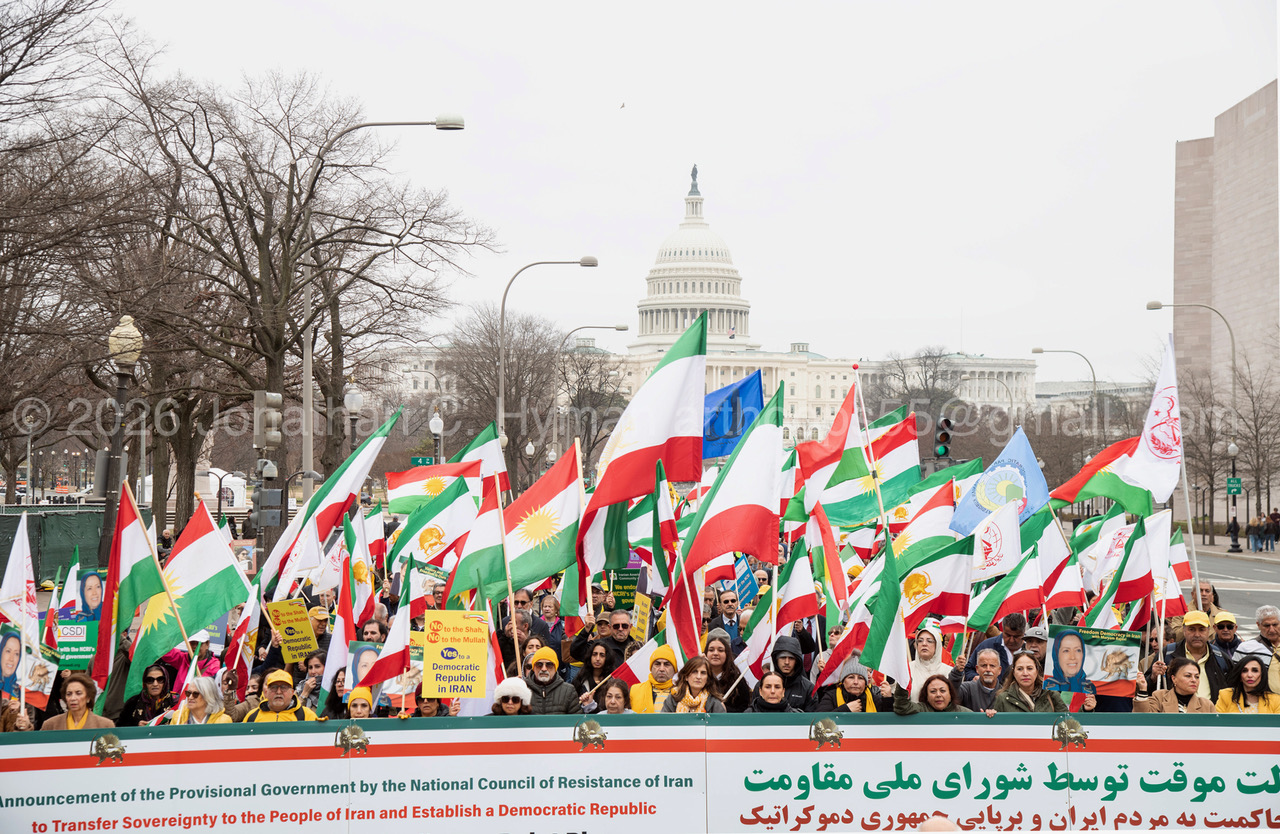 Crowd waving Iranian and Kurdish flags at a pro-democracy rally in front of the United States Capitol